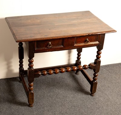 Lot 696 - A William and Mary rectangular oak table, the...