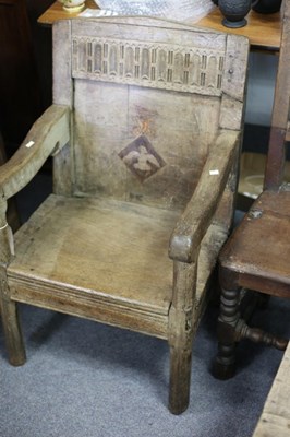 Lot 716 - A 17th Century oak armchair, the back with...