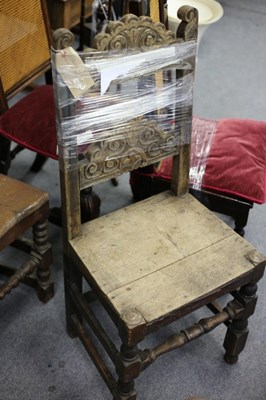 Lot 718 - A 17th Century oak single chair with scroll...