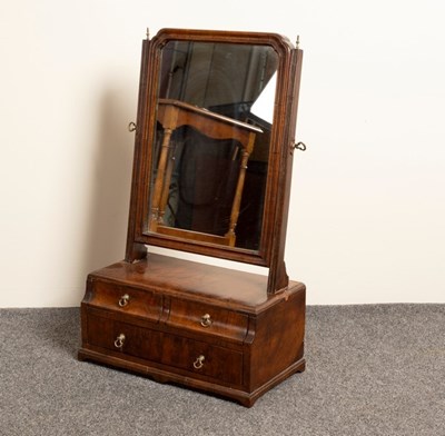 Lot 722 - An 18th Century walnut swing frame mirror, the...