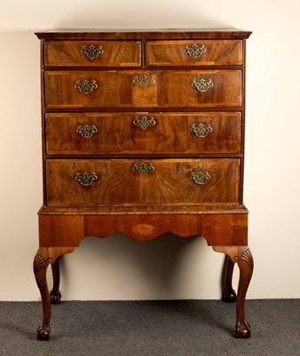 Lot 728 - An early 18th century figured walnut and...