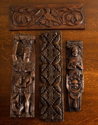 Lot 731 - A 17th Century carved oak panel of a man with...