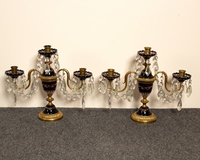 Lot 762 - A pair of gilt metal mounted two-branch, three-...