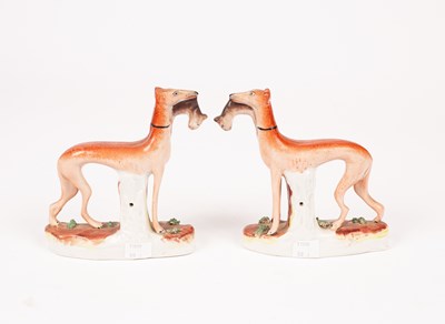 Lot 232 - A pair of Staffordshire figures