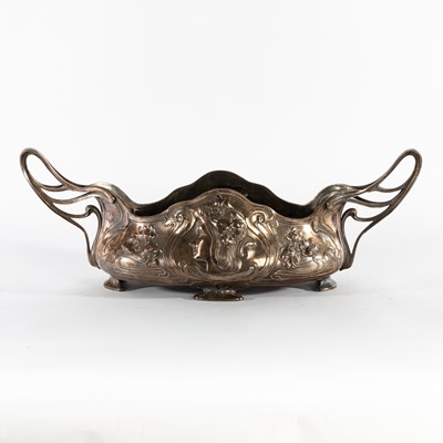 Lot 37 - An Art Nouveau bowl with stylised handles to...