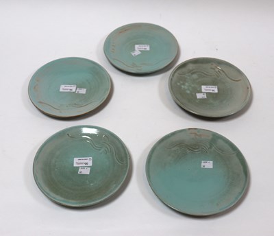 Lot 96 - Sibley Pottery, five plates with celadon glaze...