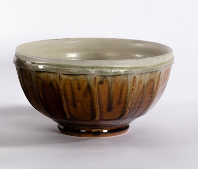 Lot 202 - Mike Dodd, a celadon and treacle glaze...