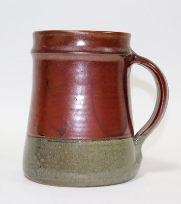 Lot 225 - Don Jones, a tankard in red oxide and ash...