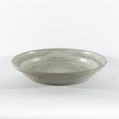 Lot 229 - Paul Barron, a shallow circular bowl, pale...