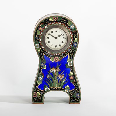 Lot 570 - A cloisonne enamel cased clock, of cartouche...