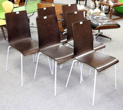 Lot 586 - Six stacking chairs, dark plywood on grey...