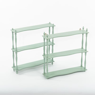 Lot 603 - A pair of green painted hanging shelves on...