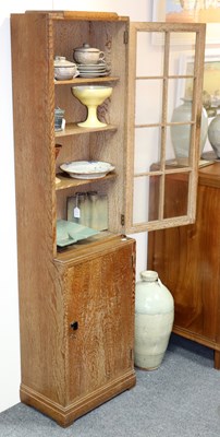 Lot 612 - An Art Deco style limed oak display cabinet...