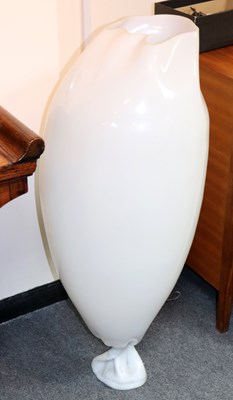 Lot 624 - A white composition floor lamp, 102cm high