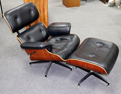 Lot 634 - After Charles & Ray Eames, a modern reclining...