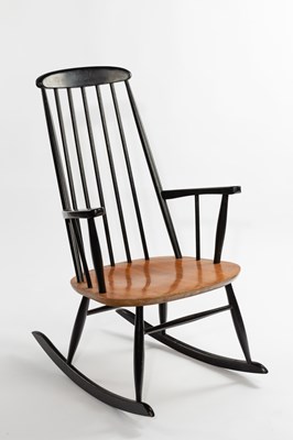 Lot 635 - Style of Ilmair Tapiovaara, a rocking chair,...