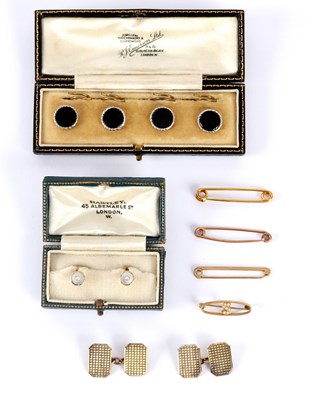 Lot 6 - A set of four onyx dress buttons, set in 9ct...