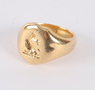 Lot 11 - An 18ct gold signet ring, (worn),...