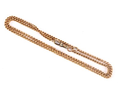 Lot 20 - An unhallmarked yellow metal chain with clip...