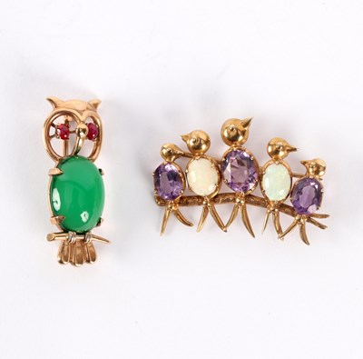 Lot 27 - A gem set owl brooch in a 9ct gold setting and...