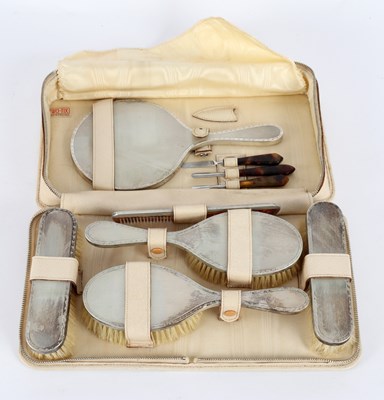 Lot 94 - A silver backed travel dressing set, TP,...