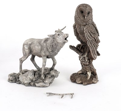 Lot 107 - A filled silver model of an owl on a stump, 22....