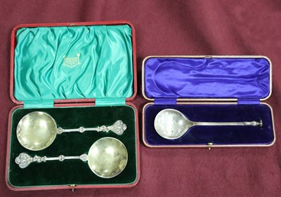 Lot 117 - A pair of silver spoons with decorative...