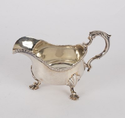 Lot 126 - A George II style silver sauce boat, London...