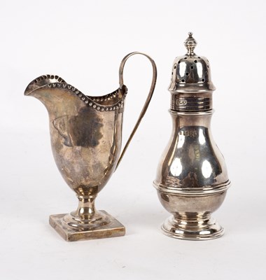 Lot 133 - A Georgian style silver cream jug, Britannia...