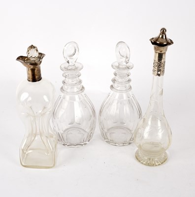 Lot 165 - A silver mounted hourglass shaped decanter,...