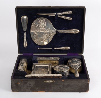 Lot 179 - A Chinese silver coloured metal dressing set...