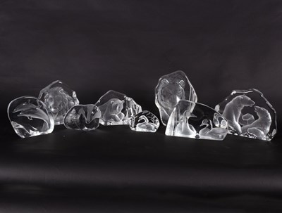 Lot 202 - A collection of eight clear glass signed...