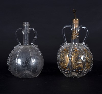 Lot 206 - Two Dutch engraved glass decanters, 19th...