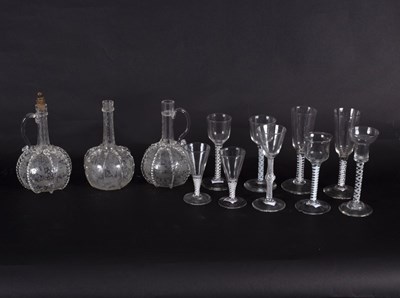 Lot 207 - Three engraved Dutch glass decanters, two...