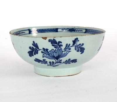 Lot 231 - An English Delftware blue and white bowl,...