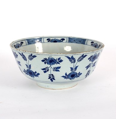 Lot 232 - An English Delftware blue and white punch bowl,...