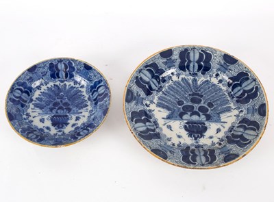 Lot 248 - Two Dutch Delft peacock pattern plates, second...