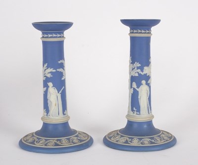 Lot 259 - A pair of Wedgwood blue jasper candlesticks,...