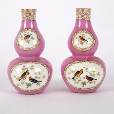 Lot 273 - A pair of Meissen pink ground double gourd...