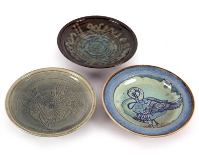 Lot 292 - Three 20th Century stoneware chargers; one by...