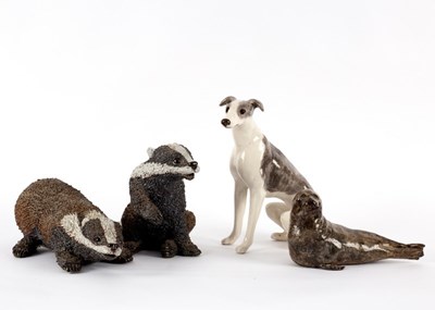 Lot 294 - Four pottery models of animals, comprising two...