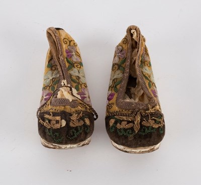 Lot 311 - A pair of Chinese child's shoes embroidered...