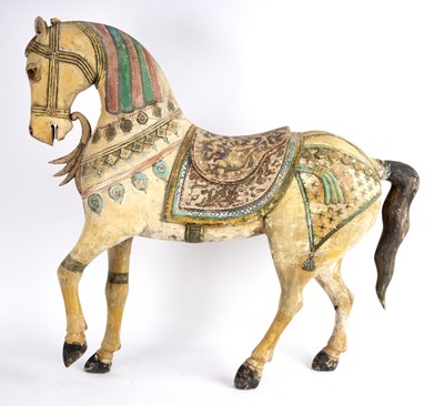 Lot 312 - An Indian carved, painted and decorated wooden...