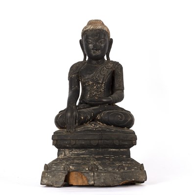 Lot 322 - A Thai ebonised carved wood figure of a Buddha...