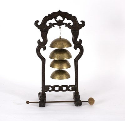 Lot 336 - A Chinese table bell, the four graduated brass...