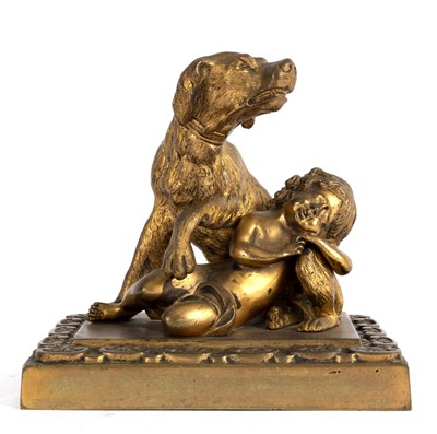 Lot 368 - A gilt metal figure of a dog guarding a...