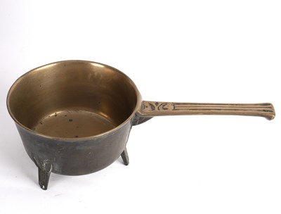 Lot 388 - An 18th Century bell metal skillet on three...