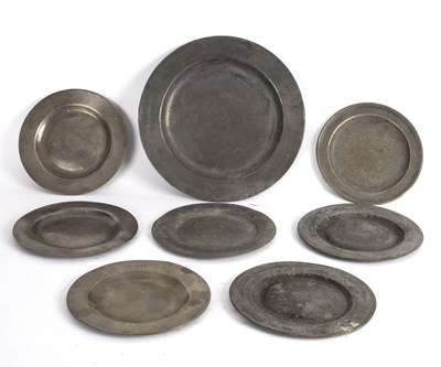 Lot 406 - A pewter dish, 36cm diameter and seven smaller...