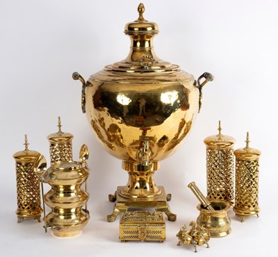 Lot 410 - A brass two-handled samovar on a pedestal base,...