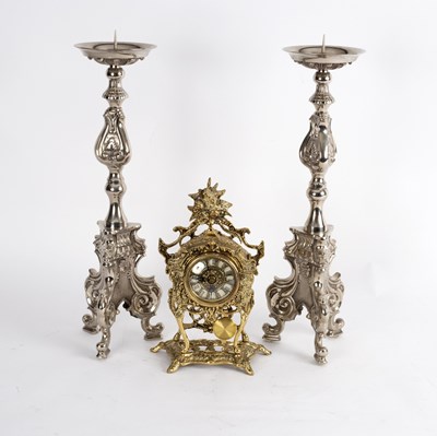 Lot 411 - A pair of silvered pricket candlesticks of...